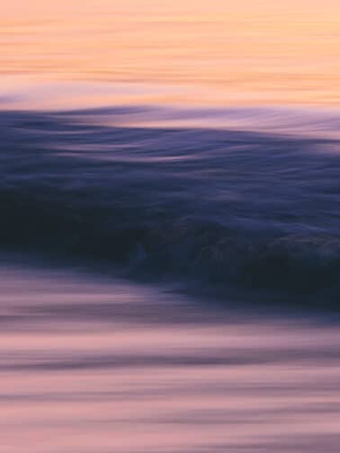 Ocean waves at sunrise, long exposure photography