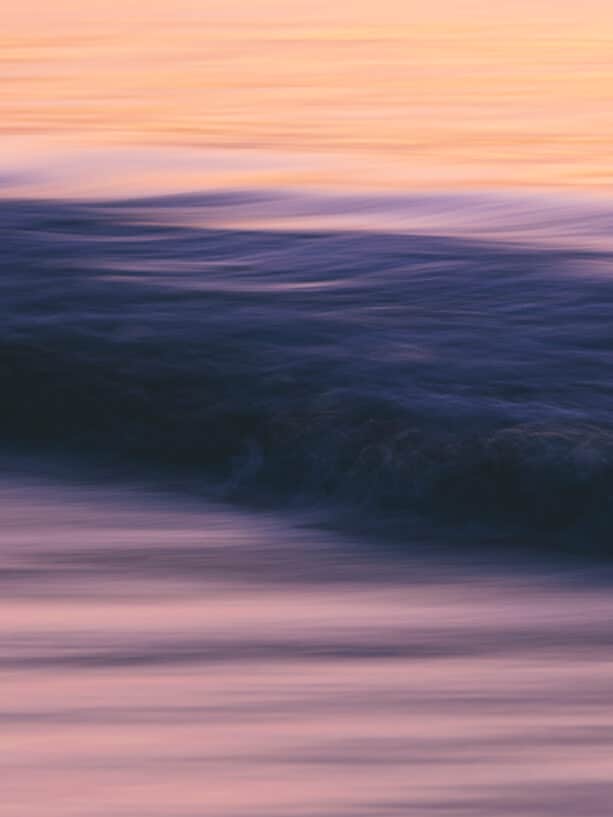 Ocean waves at sunrise, long exposure photography