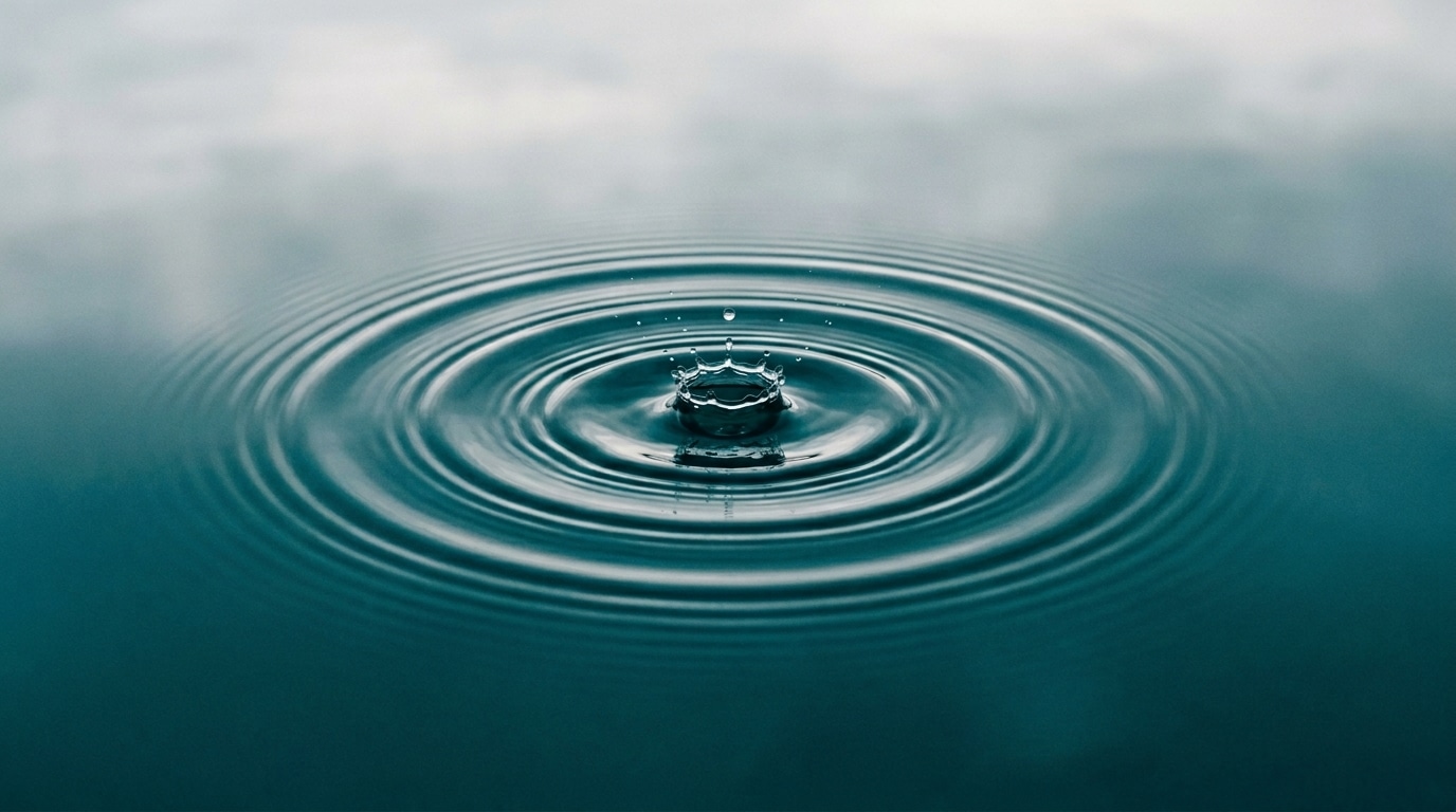 2 macro photography of a single water droplet impa