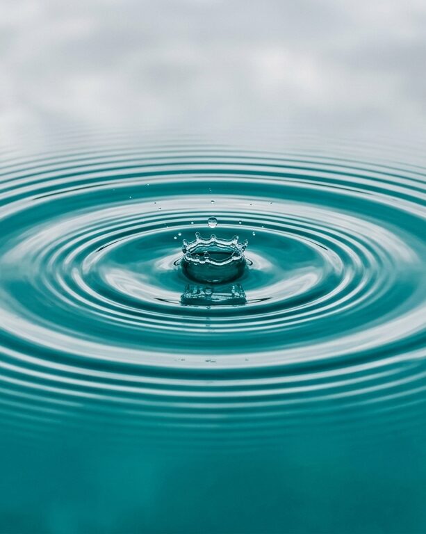 Water droplet impact creating rings