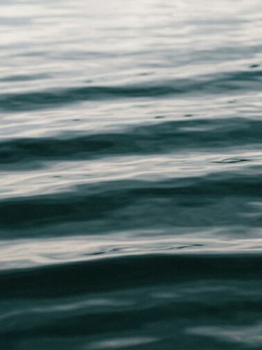 Water reflection pale grey sky