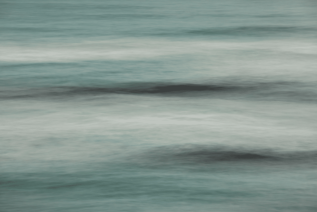 Woman sitting quietly with her therapist, exploring relational trauma therapy