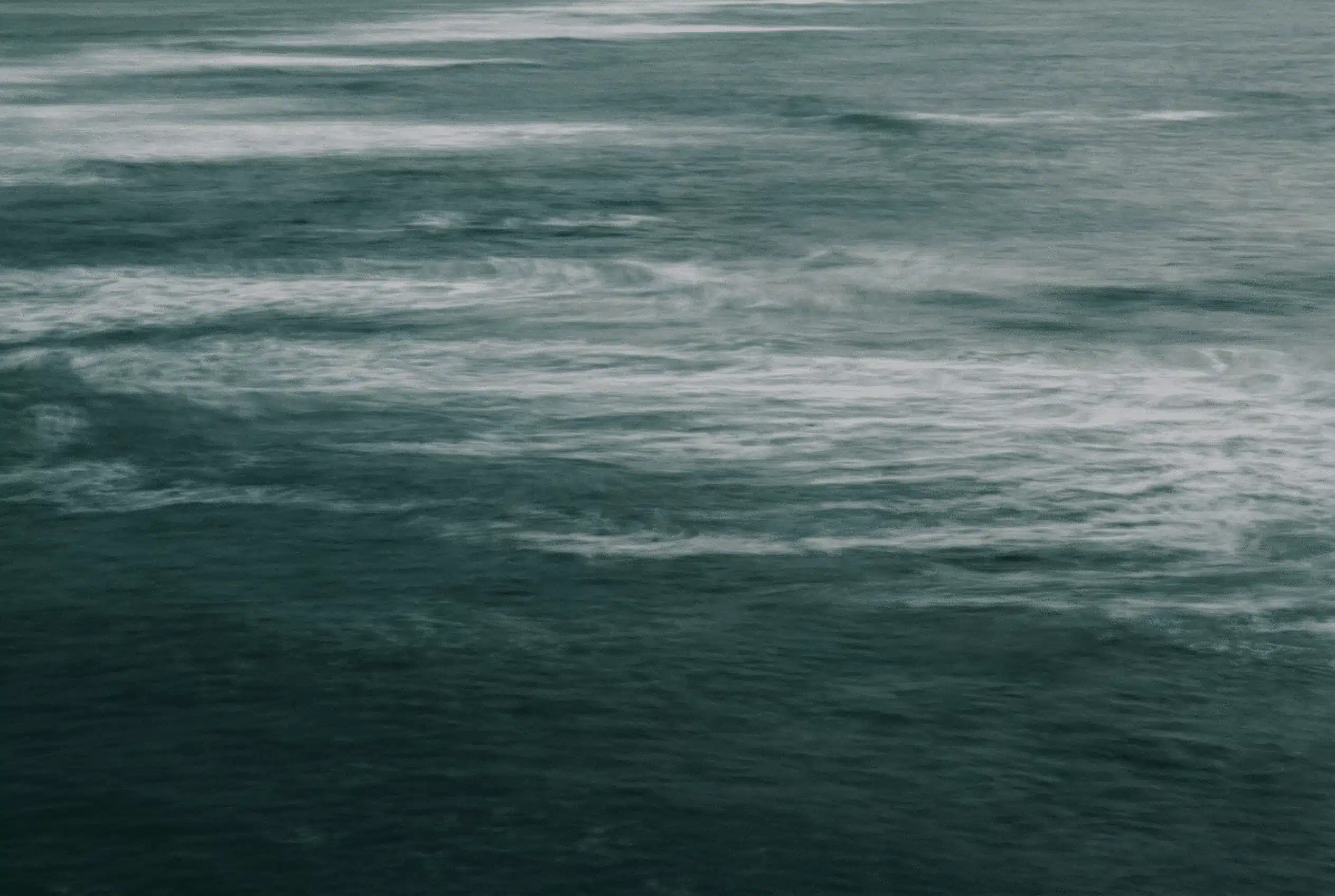 Soft light through a window casting shadows on a quiet room — therapy for anxious attachment — Annie Wright trauma therapy